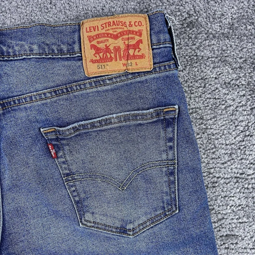 Levis 511 Slim Fit Cut Off Denim Shorts Mens 32 Blue Medium Wash Raw Hem Jorts